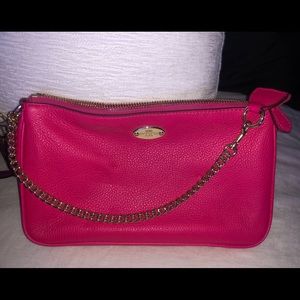 Pink clutch bag *Coach*
